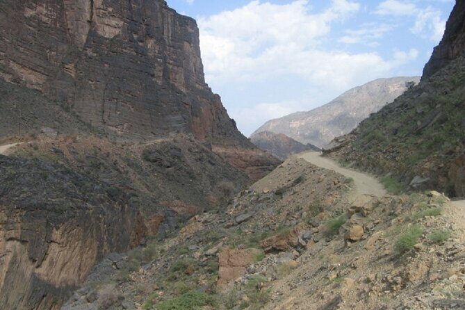 Day Trip to Wadi Bani Awf, Balad Sayt, Nakhal Fort & Hot Spring - Ain Al Thawarah hot spring: warm mineral water, shaded picnic comfort
