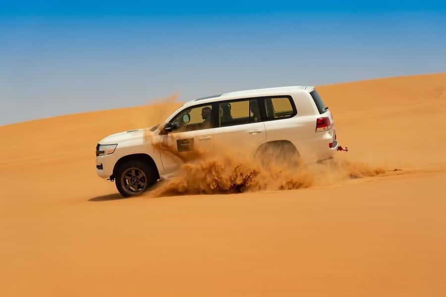 Dubai: Desert Safari with BBQ Dinner - Getting picked up for dune time in Dubai