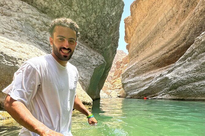 From Muscat Wadi Shab and Bimmah Sinkhole Tour - The canyon walk to turquoise pools (with a boat at the start)