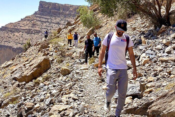 Full Day Guided Tour to Balcony Walk and Hidden Lake With Pickup Included - Deserted Sab Bani Khamis: old stone ruins with present-day meaning
