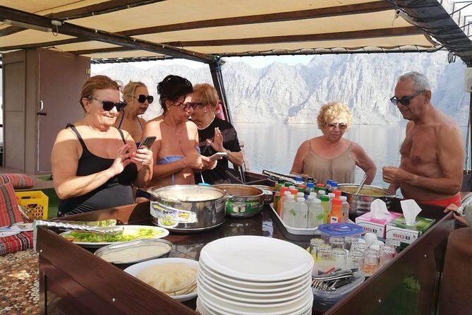 Khasab Dhow Cruise Full day, Buffet Lunch on Board, swimming - Traditional lunch on board: buffet value that actually matters