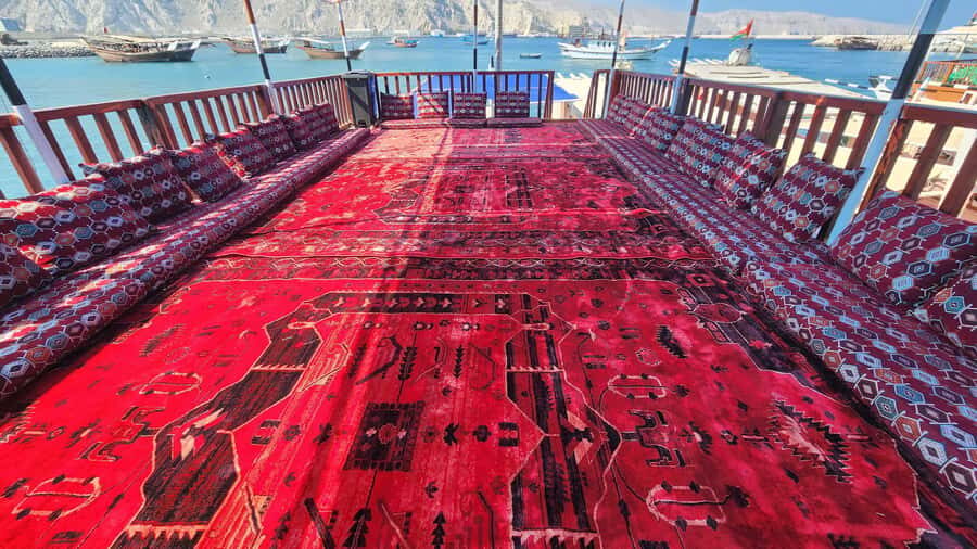 Khasab: Half-Day Dhow Cruise, Dolphin Watching, & Snorkeling - Onboard the Traditional Dhow: Service, Snacks, and the People Who Run It