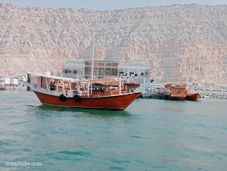 Khasab: Half-Day Dhow Cruise, Dolphin Watching, & Snorkeling - Dolphin Watching Near the Fishing Village Stop