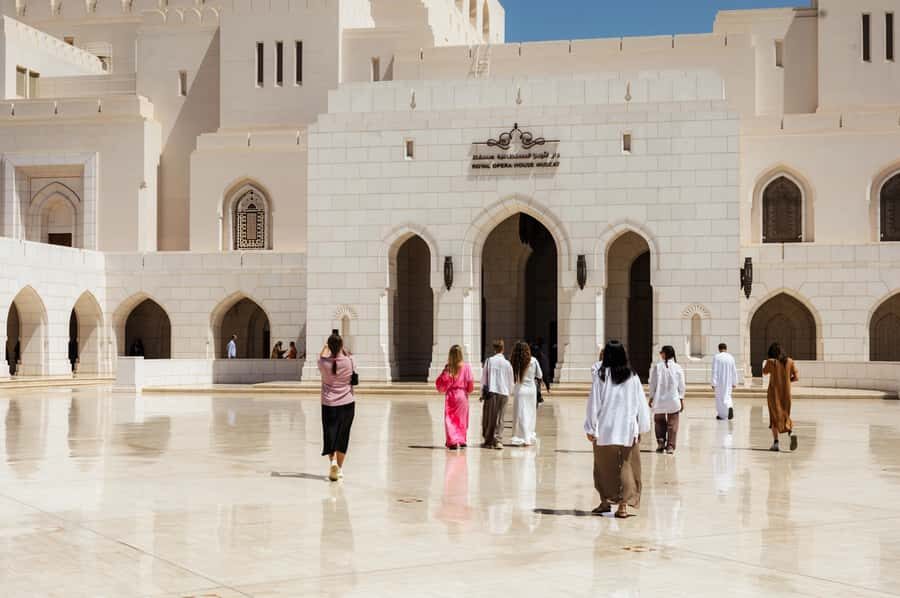 Muscat: Full-Day City Tour - Entering Sultan Qaboos Grand Mosque with the right setup