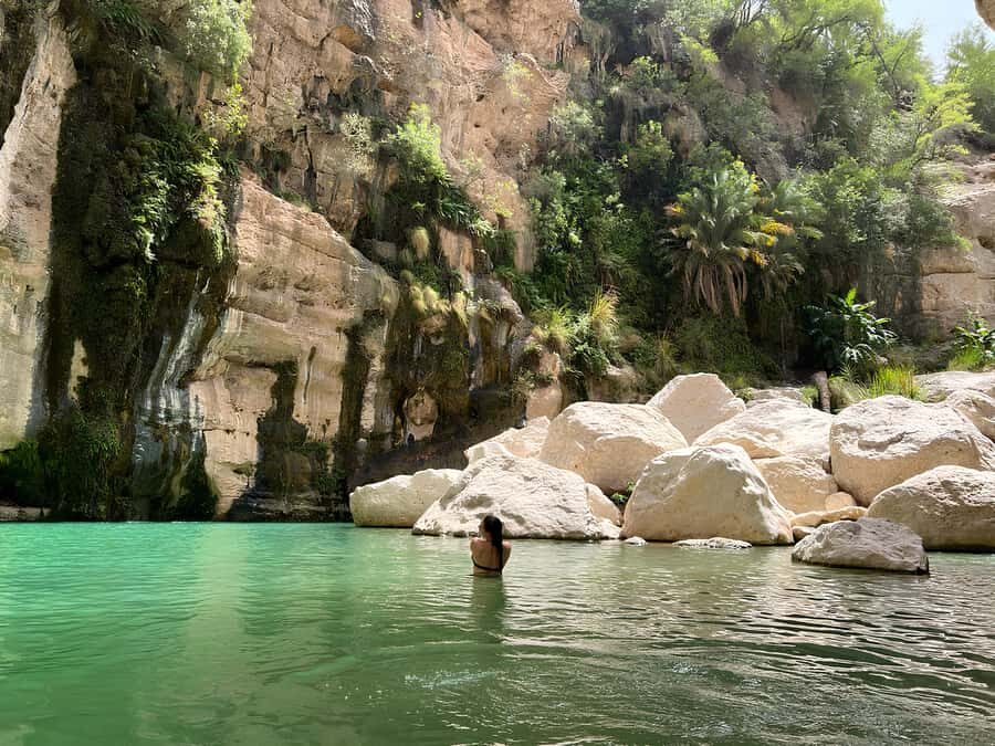 Muscat: Wadi Mibam Private Full Day Tour by 4x4 car - Wadi Mibam: waterfall views, big rocks, and rope-access swimming