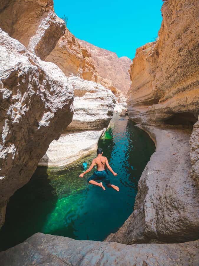 Muscat: Wadi Shab & Bimmah Sinkhole Tour with Pickup & Lunch - The Boat Crossing and the Valley Walk to the Canyon