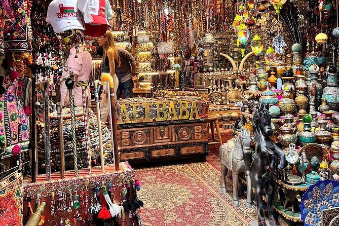 Private Muscat City Tour - Full Day - Bait Al Zubair museum: weapons, khanjar, and an outdoor village/souk setup