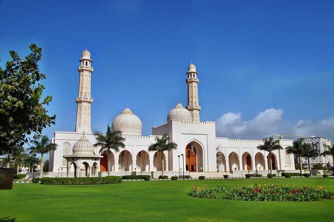 Salalah City Tour: Discover Salalahs Treasures with a Local Guide - Sultan Qaboos Mosque: bright windows, smaller scale, and the Ladies Prayer Hall