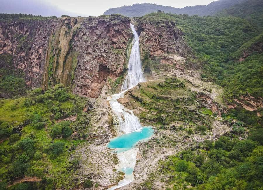 Salalah: Wadi Darbat, Jabal Samhan, Baobab, Mirbat Sand Dune - The Birds Well stop: Tawi Attair sinkhole in plain view