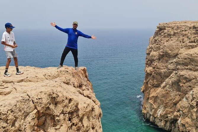 Sinkhole, Fins & Wadi Tiwi Explorer: Swim, Hike & Scenic Views - Stop 4: Fins Beach for cliffs and sunset-style colors