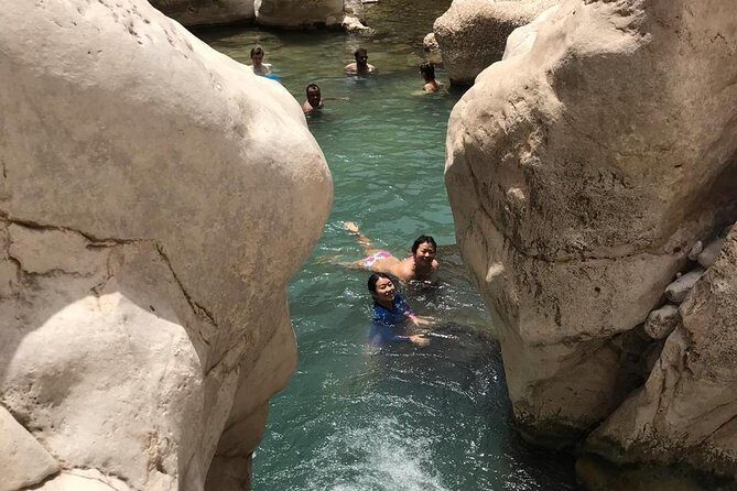 Tour Jawahir 2 Days-1 Night In Wahiba Sands, Oman Tours Package - Bimmah Sinkhole: turquoise limestone, near-the-coast viewpoint energy
